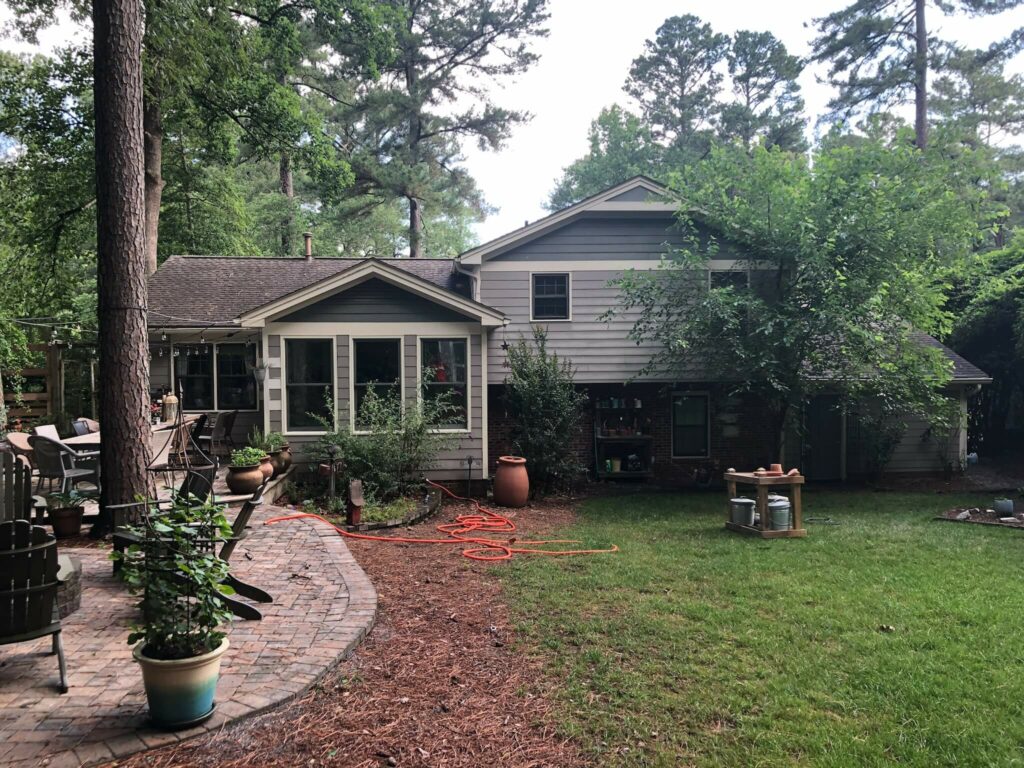 a house with yard and trees in Cary NC
