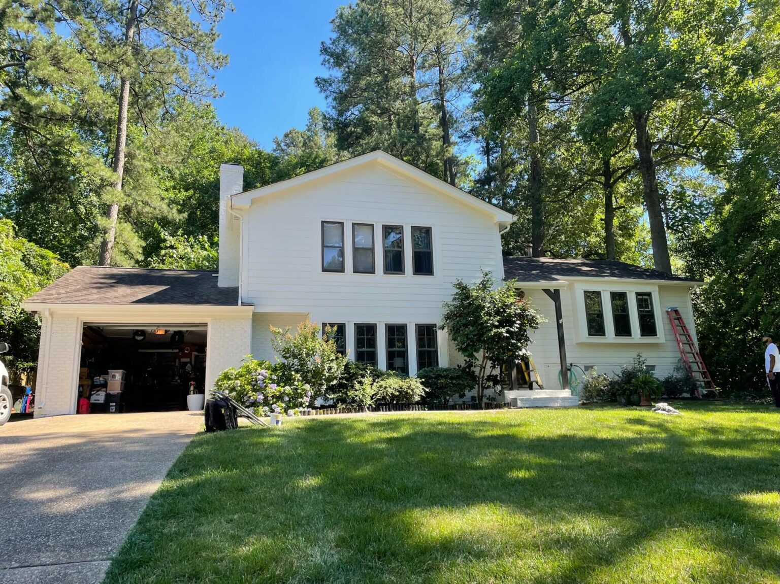 The same Cary, NC home after an Oak City Coatings exterior repaint in bright white