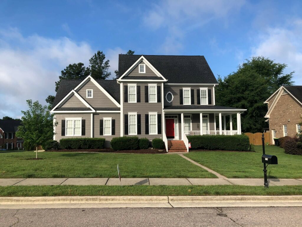 Home exterior repainted in Gauntlet Gray by Oak City Coatings in Raleigh, NC