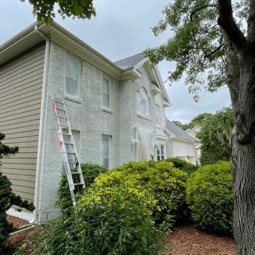 White-and-blue-shutter-painted-brick-cary-nc