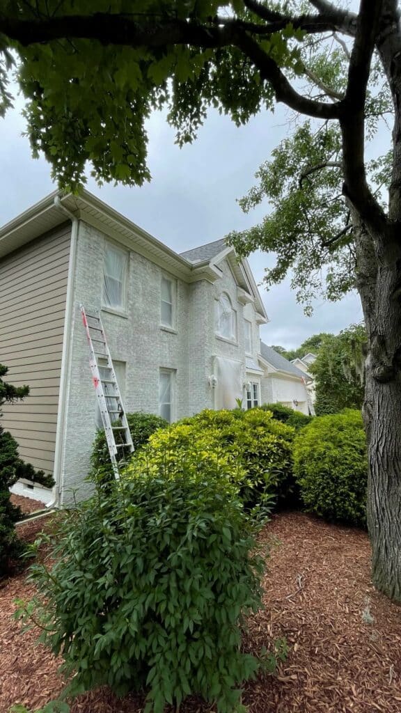 White-and-blue-shutter-painted-brick-cary-nc