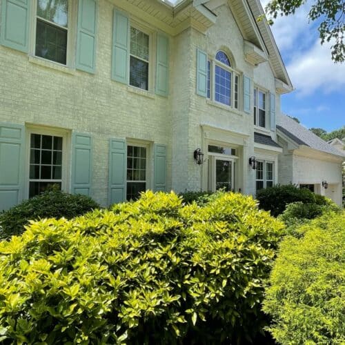 White-and-blue-shutter-painted-brick-cary-nc