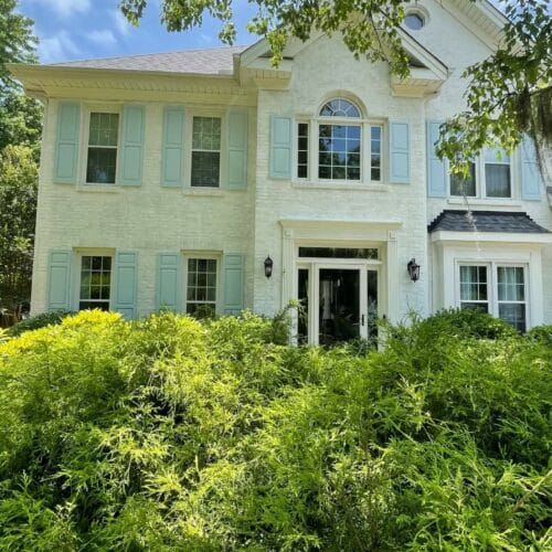 White-and-blue-shutter-painted-brick-cary-nc