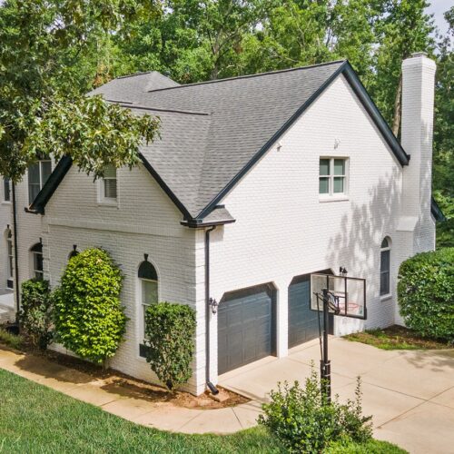 Painted brick home by raleigh interior and exterior paint company, Oak City Coatings.