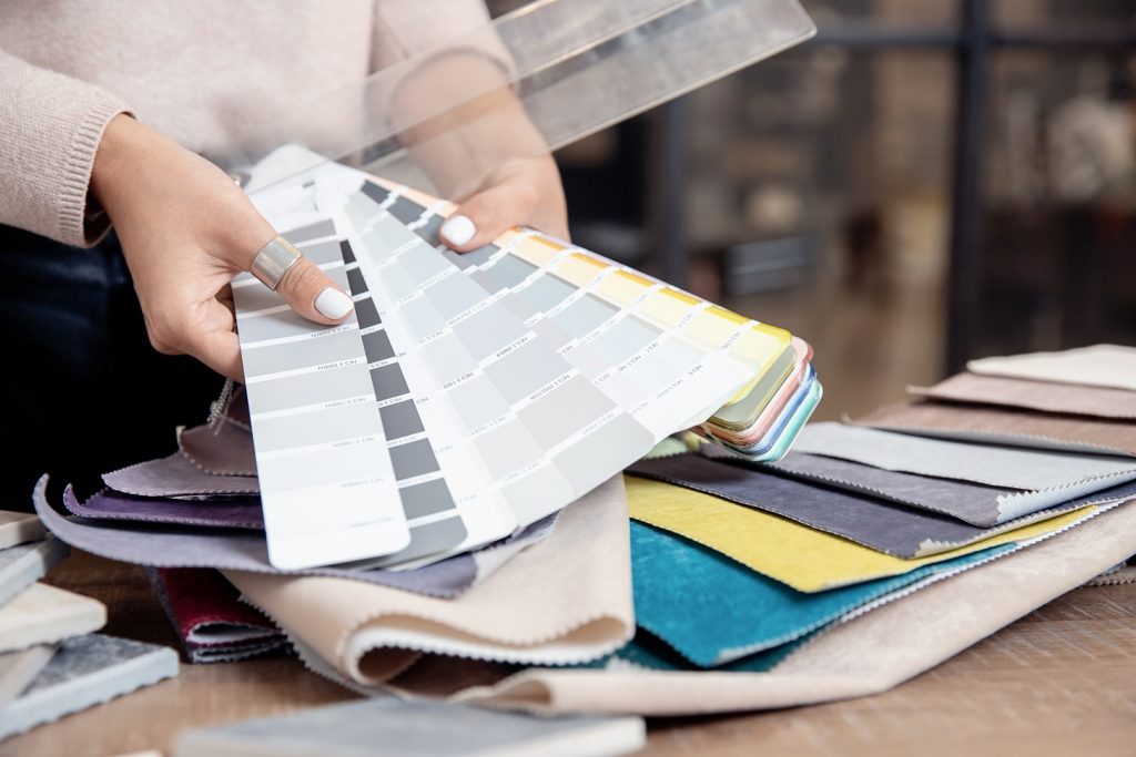 color specialist teaching how to find match paint on wall