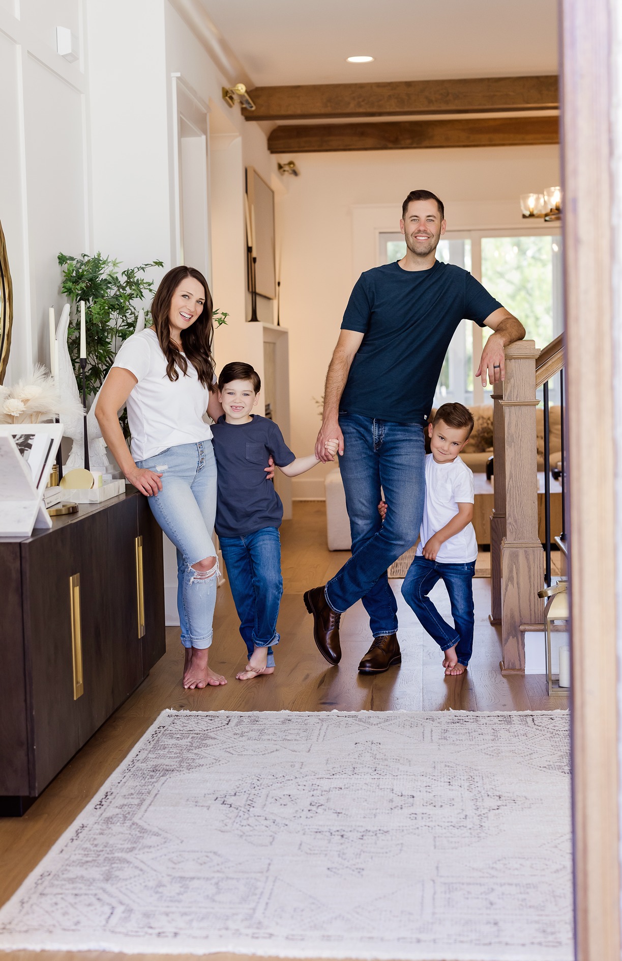 Oak City Coatings owners Nick and Stephanie O'Keefe with their kids at home in the Raleigh area