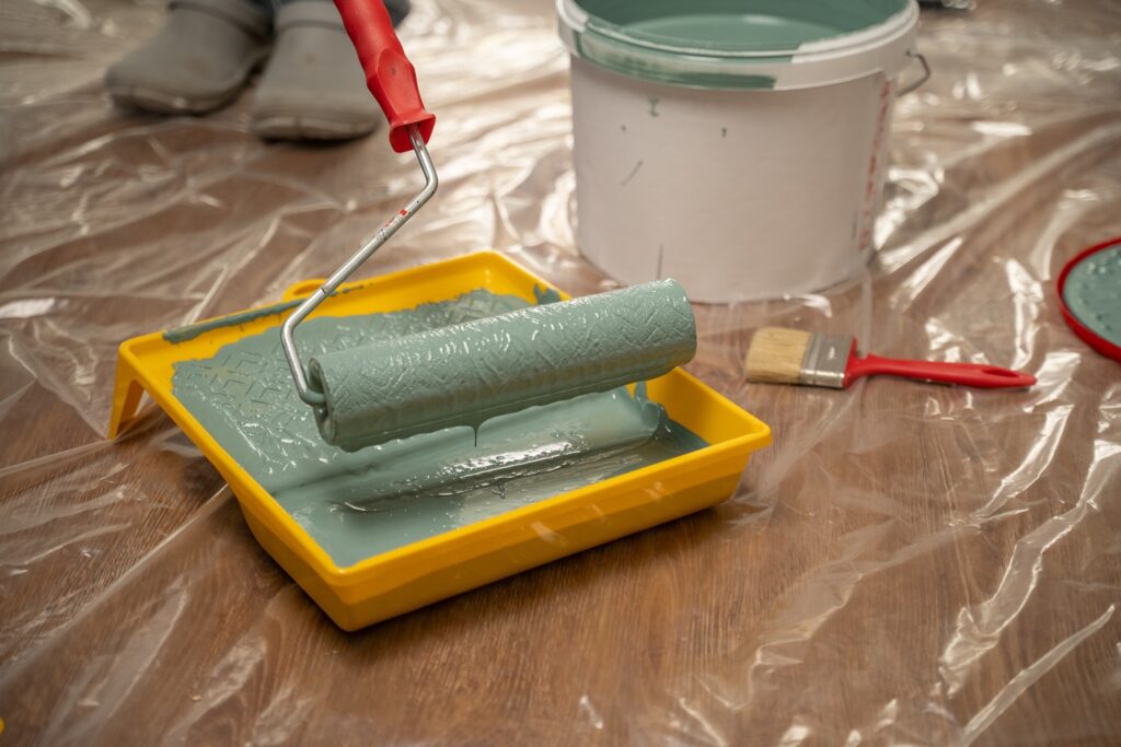 green paint in roller tray