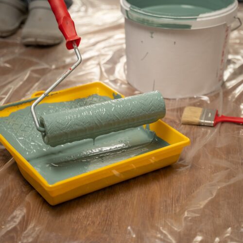 green paint in roller tray