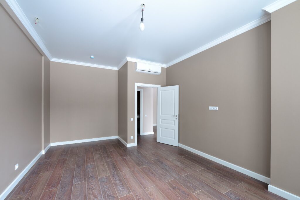 recently painted room with tan walls