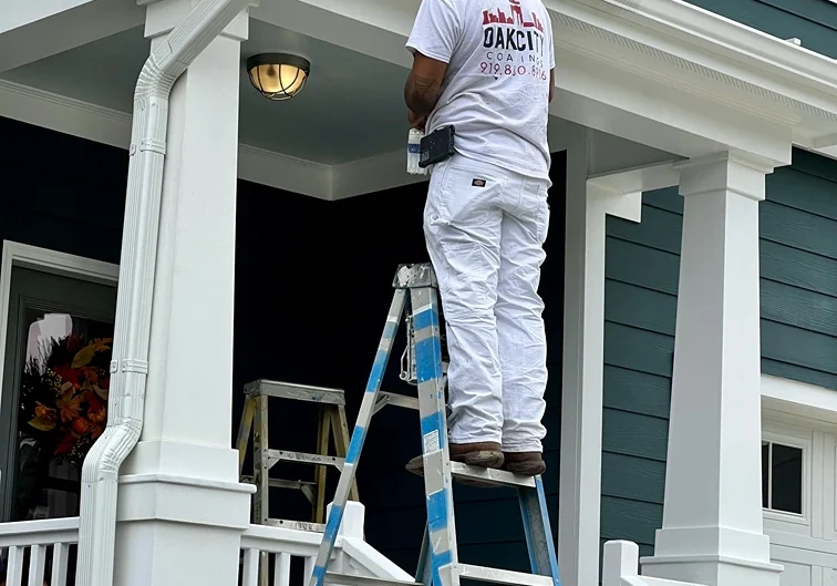painting exterior of house in Fuquay-Varina NC
