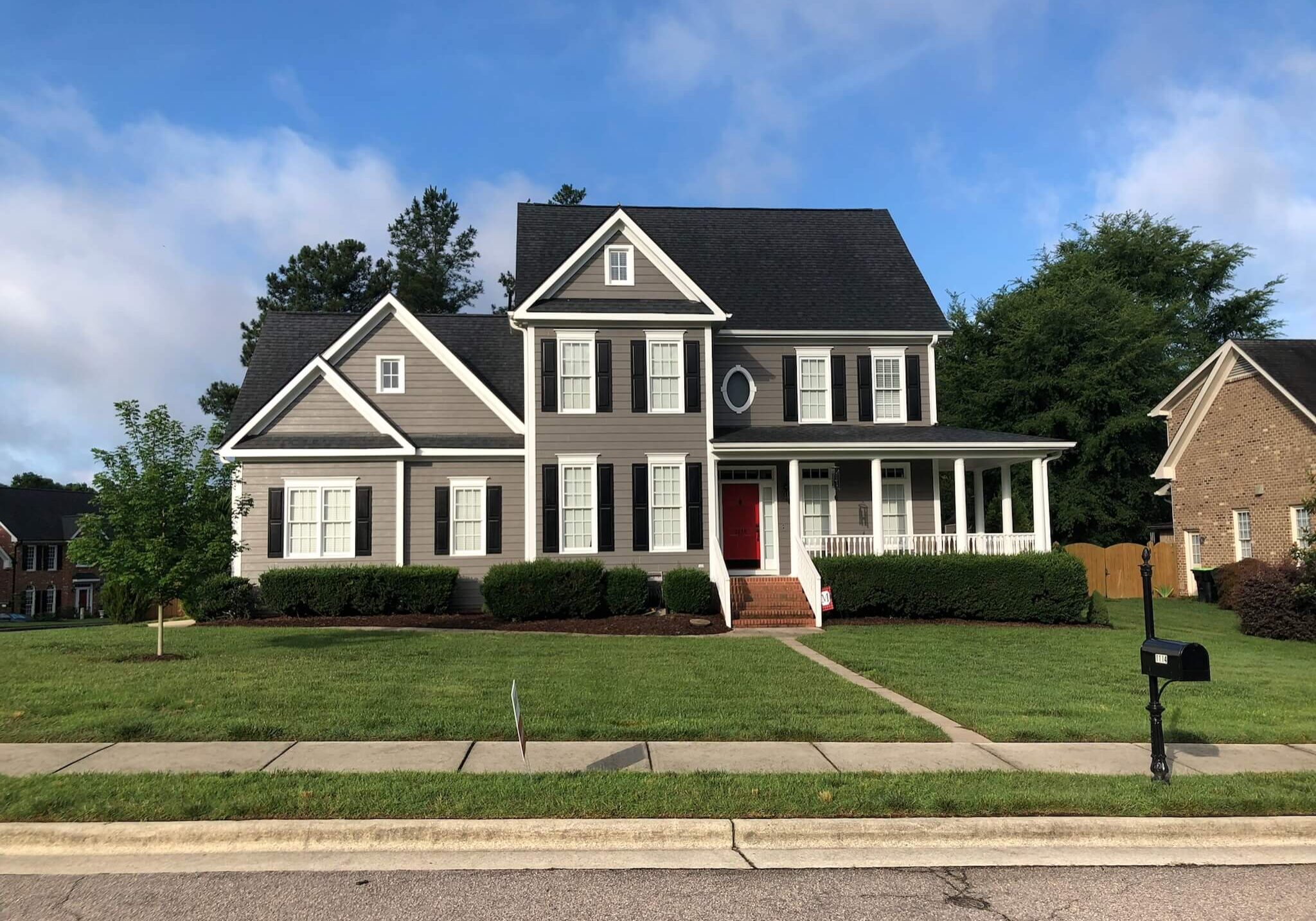 Home exterior repainted in Gauntlet Gray by Oak City Coatings in Raleigh, NC