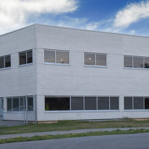 white painted brick commercial building