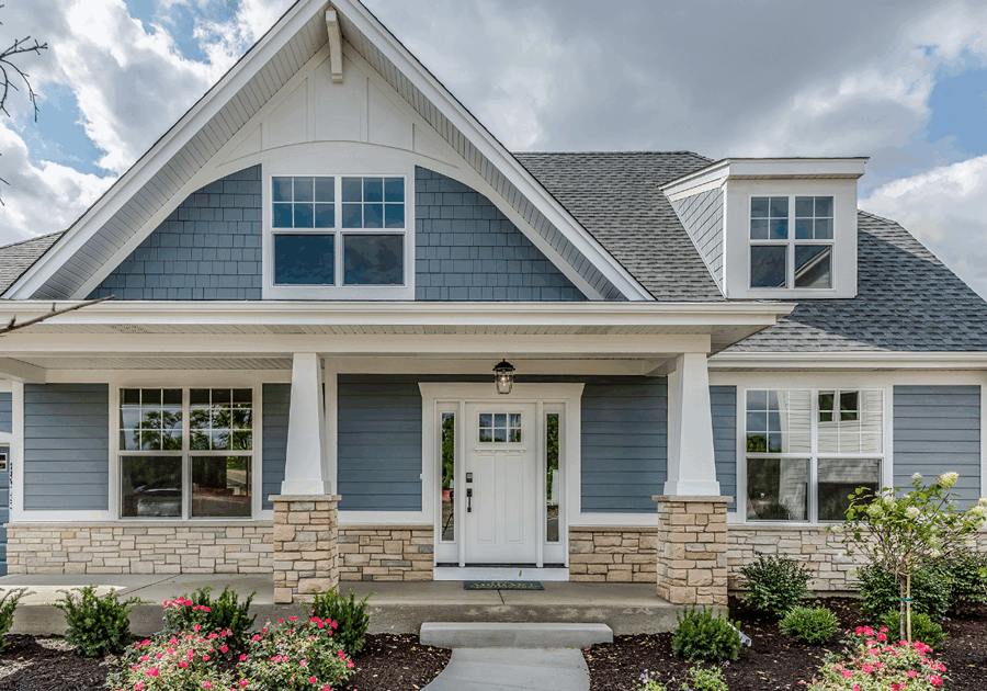 blue house with painted hardie board siding in Holly Springs